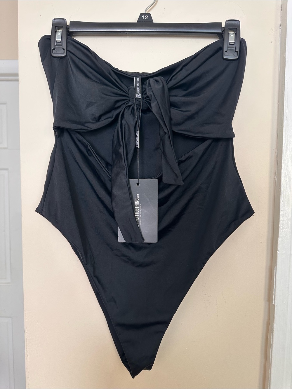 PrettyLittleThing Black Strapless One-Piece with Front Tie Detail Size 14